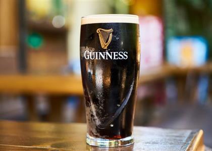 A História e o Simbolismo do Logotipo da Guinness