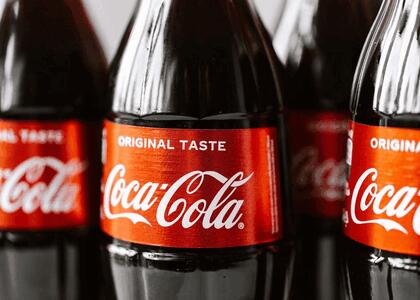 A Origem e a Evolução do Logotipo da Coca-Cola